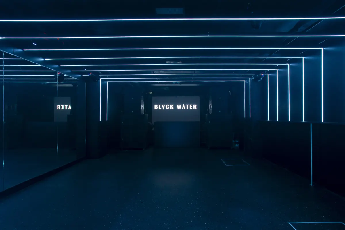 BLVCK WATER dance floor lined with strip lights